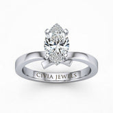 White Gold Marquise Diamond Solitaire Engagement Ring With Modern Twist Shank