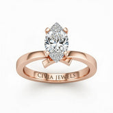 Rose Gold Marquise Diamond Solitaire Engagement Ring With Modern Twist Shank