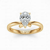 Yellow Gold Pear Diamond Solitaire Engagement Ring With Modern Twist Shank