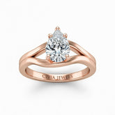 Rose Gold Pear Cut Solitaire Engagement Ring with Contemporary Bypass Shank