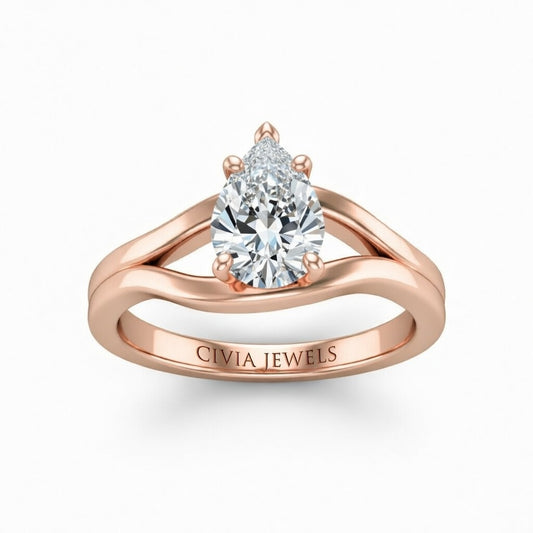 Rose Gold Pear Cut Solitaire Engagement Ring with Contemporary Bypass Shank
