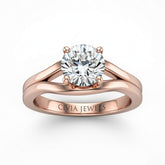 Rose Gold Round Cut Solitaire Engagement Ring with Contemporary Bypass Shank