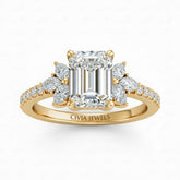 Yellow Gold Emerald Cut Engagement Ring With Marquise Diamond Floral Side Clusters And Pavé Band