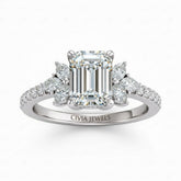 Silver Emerald Cut Engagement Ring With Marquise Diamond Floral Side Clusters And Pavé Band