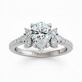 White Gold Pear Cut Engagement Ring With Marquise Diamond Floral Side Clusters And Pavé Band