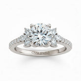 White Gold Round Cut Engagement Ring With Marquise Diamond Floral Side Clusters And Pavé Band