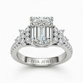 Silver Emerald Cut Engagement Ring With Floral Diamond Cluster Sides And Pavé Band