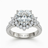 White Gold Heart Cut Engagement Ring With Floral Diamond Cluster Sides And Pavé Band