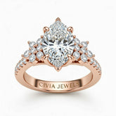 Rose Gold Marquise Cut Engagement Ring With Floral Diamond Cluster Sides And Pavé Band