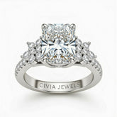 White Gold Radiant Cut Engagement Ring With Floral Diamond Cluster Sides And Pavé Band