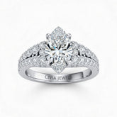 Silver Marquise Cut Solitaire Engagement Ring With Pavé Diamond Band And Classic Four-Prong Setting