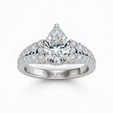 Silver Pear Cut Solitaire Engagement Ring With Pavé Diamond Band And Classic Four-Prong Setting