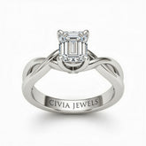 White Gold Emerald Diamond Solitaire Engagement Ring With Interwoven Twist Shank