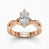 Rose Gold Marquise Diamond Solitaire Engagement Ring With Interwoven Twist Shank