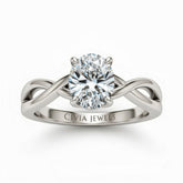 Silver Oval Diamond Solitaire Engagement Ring With Interwoven Twist Shank