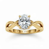 Yellow Gold Oval Diamond Solitaire Engagement Ring With Interwoven Twist Shank