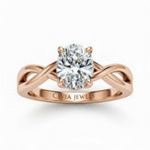 Rose Gold Oval Diamond Solitaire Engagement Ring With Interwoven Twist Shank