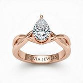 Rose Gold Pear Diamond Solitaire Engagement Ring With Interwoven Twist Shank