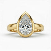 Yellow Gold Pear Cut Bezel Set Solitaire Engagement Ring