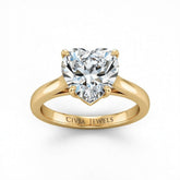 Yellow Gold Heart Cut Solitaire Engagement Ring with Sleek Tapered Shank