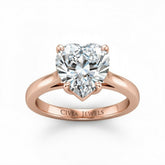 Rose Gold Heart Cut Solitaire Engagement Ring with Sleek Tapered Shank