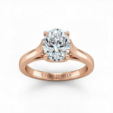 Rose Gold Oval Cut Solitaire Engagement Ring with Sleek Tapered Shank