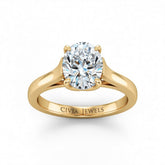 Yellow Gold Oval Cut Solitaire Engagement Ring with Sleek Tapered Shank