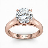Rose Gold Round Cut Solitaire Engagement Ring with Sleek Tapered Shank