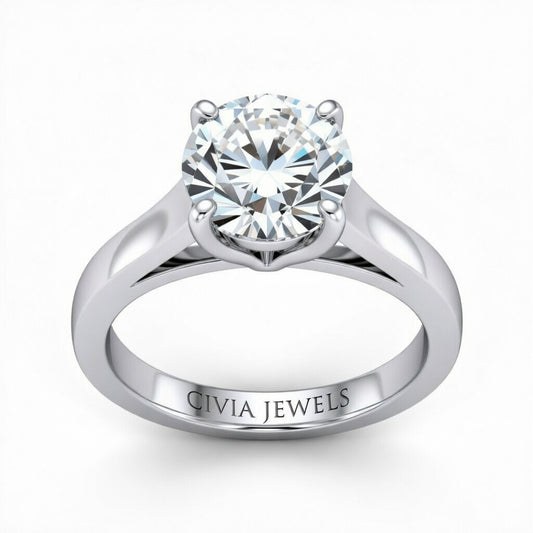 White Gold Round Cut Solitaire Engagement Ring with Sleek Tapered Shank