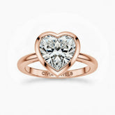 Rose Gold Heart Cut Bezel Set Solitaire Engagement Ring with Polished Comfort Fit Band
