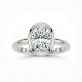 White Gold Oval Cut Bezel Set Solitaire Engagement Ring with Polished Comfort Fit Band