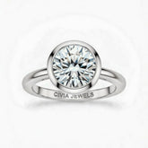 Silver Round Cut Bezel Set Solitaire Engagement Ring with Polished Comfort Fit Band