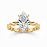 Yellow Gold Marquise Cut Solitaire Engagement Ring with Sculpted Tapered Shank