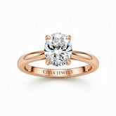 Rose Gold Oval Cut Solitaire Engagement Ring with Sculpted Tapered Shank