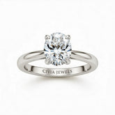 Silver Oval Cut Solitaire Engagement Ring with Sculpted Tapered Shank