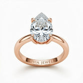 Rose Gold Pear Cut Solitaire Engagement Ring with Sculpted Tapered Shank