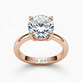 Rose Gold Round Cut Solitaire Engagement Ring with Sculpted Tapered Shank