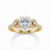 Yellow Gold Oval Brilliant Three Stone Halo Engagement Ring With Vintage Milgrain Detail