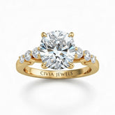 Yellow Gold Cushion Cut Engagement Ring With Diamond Scatter Accent Shoulders And Classic Four-Prong Setting