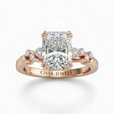 Rose Gold Radiant Cut Engagement Ring With Diamond Scatter Accent Shoulders And Classic Four-Prong Setting