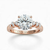 Rose Gold Round Cut Engagement Ring With Diamond Scatter Accent Shoulders And Classic Four-Prong Setting