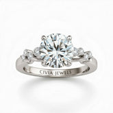White Gold Round Cut Engagement Ring With Diamond Scatter Accent Shoulders And Classic Four-Prong Setting