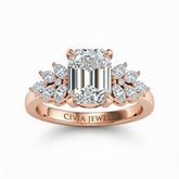 Rose Gold Emerald Cut Engagement Ring With Marquise Diamond Cluster Side Accents