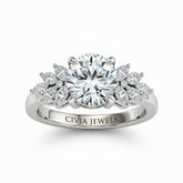 White Gold Round Cut Engagement Ring With Marquise Diamond Cluster Side Accents