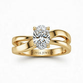 Yellow Gold Oval Cut Solitaire Engagement Ring With Sculpted Multirow Twist Shank