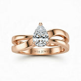 Rose Gold Pear Cut Solitaire Engagement Ring With Sculpted Multirow Twist Shank