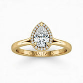Yellow Gold Pear Cut Halo Engagement Ring With Classic Four Prong Setting And Slim Band