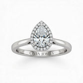 Silver Pear Cut Halo Engagement Ring With Classic Four Prong Setting And Slim Band