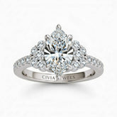 White Gold Marquise Cut Engagement Ring With Diamond Cluster Side Accents And Pavé Band