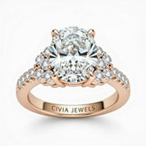 Rose Gold Oval Cut Engagement Ring With Diamond Cluster Side Accents And Pavé Band